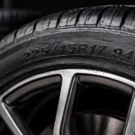 close up of tyre sidewall showing size load index and speed rating